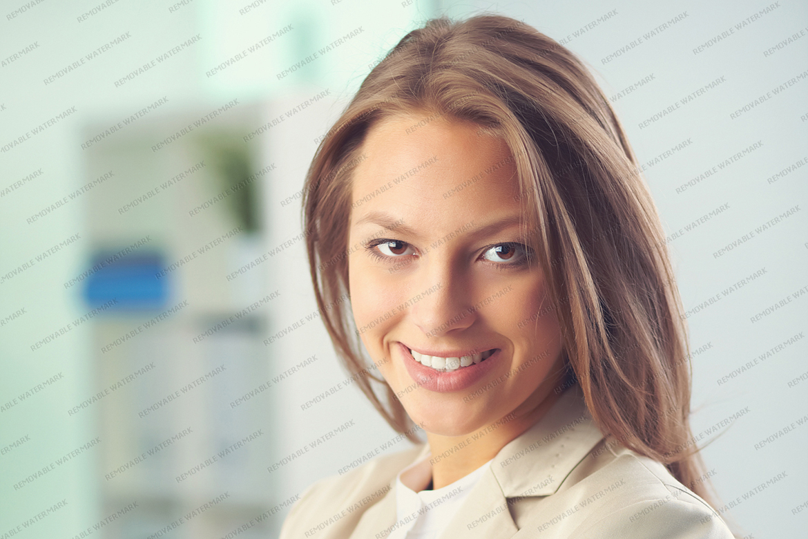 Portrait of a business lady looking at camera with smile